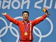 Северокорейский атлет Ким Ун Гук с золотой медалью, фото (c)AFP