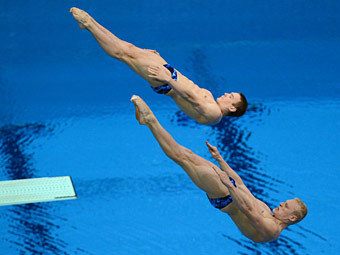 Илья Захаров и Евгений Кузнецов. Фото (c)AFP